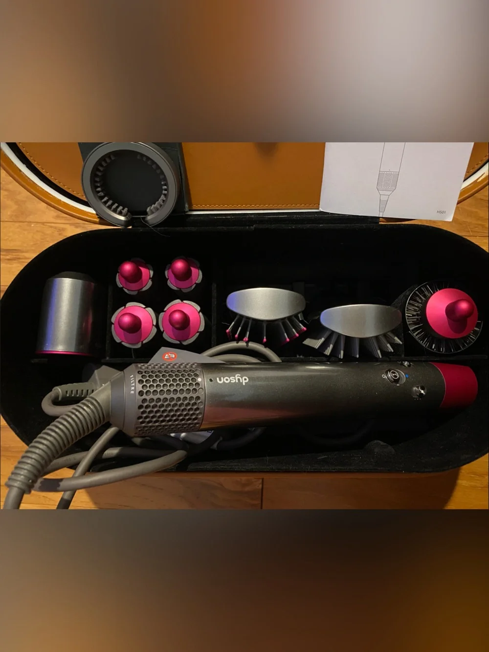 Dyson styler set in gray with pink accents